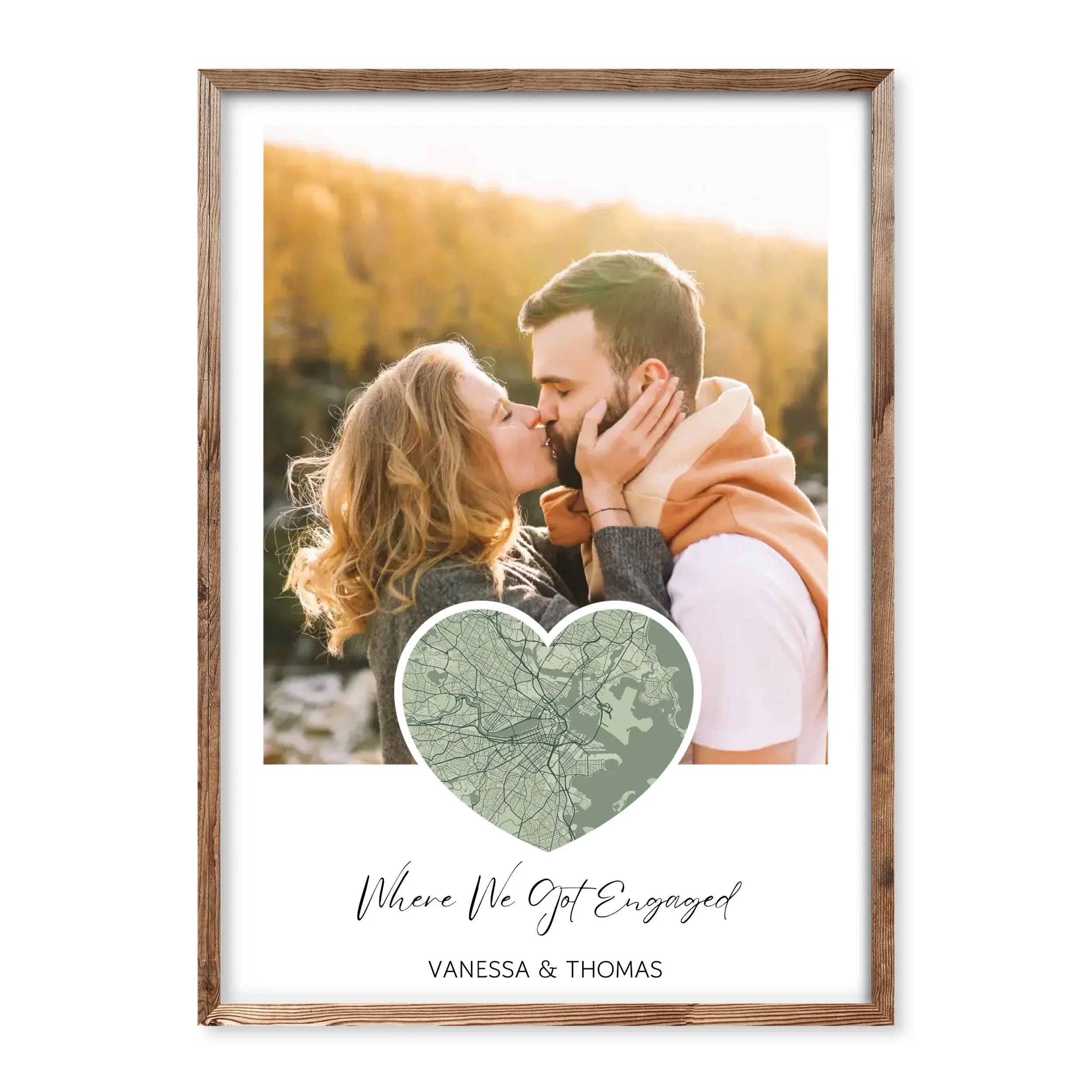 Personalised engagement map poster with photo, heart-shaped map in green, couple kissing, caption “Where We Got Engaged” with names Vanessa & Thomas.