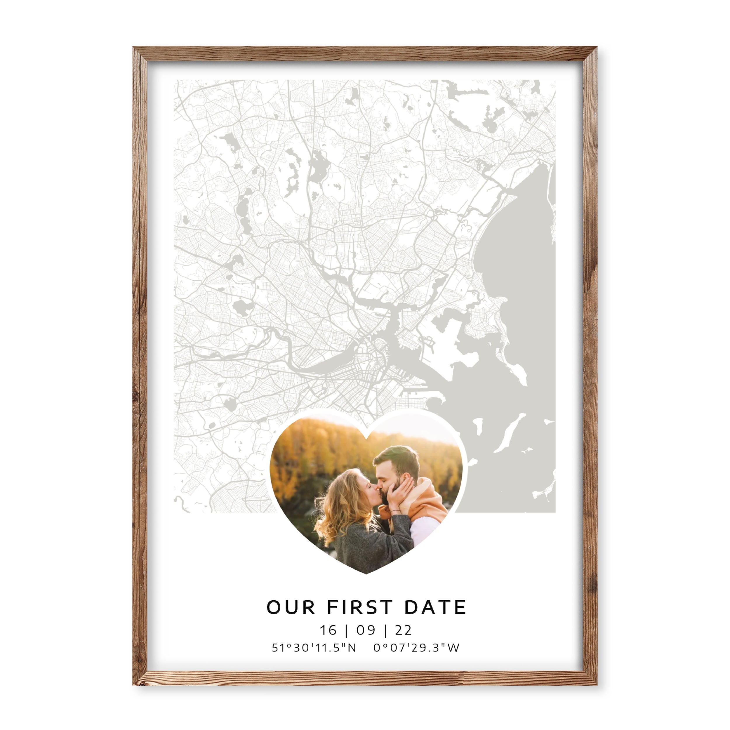 Personalised map poster with heart-shaped photo and coordinates marking the couple's first date, shown with minimalist city map in grey tones.