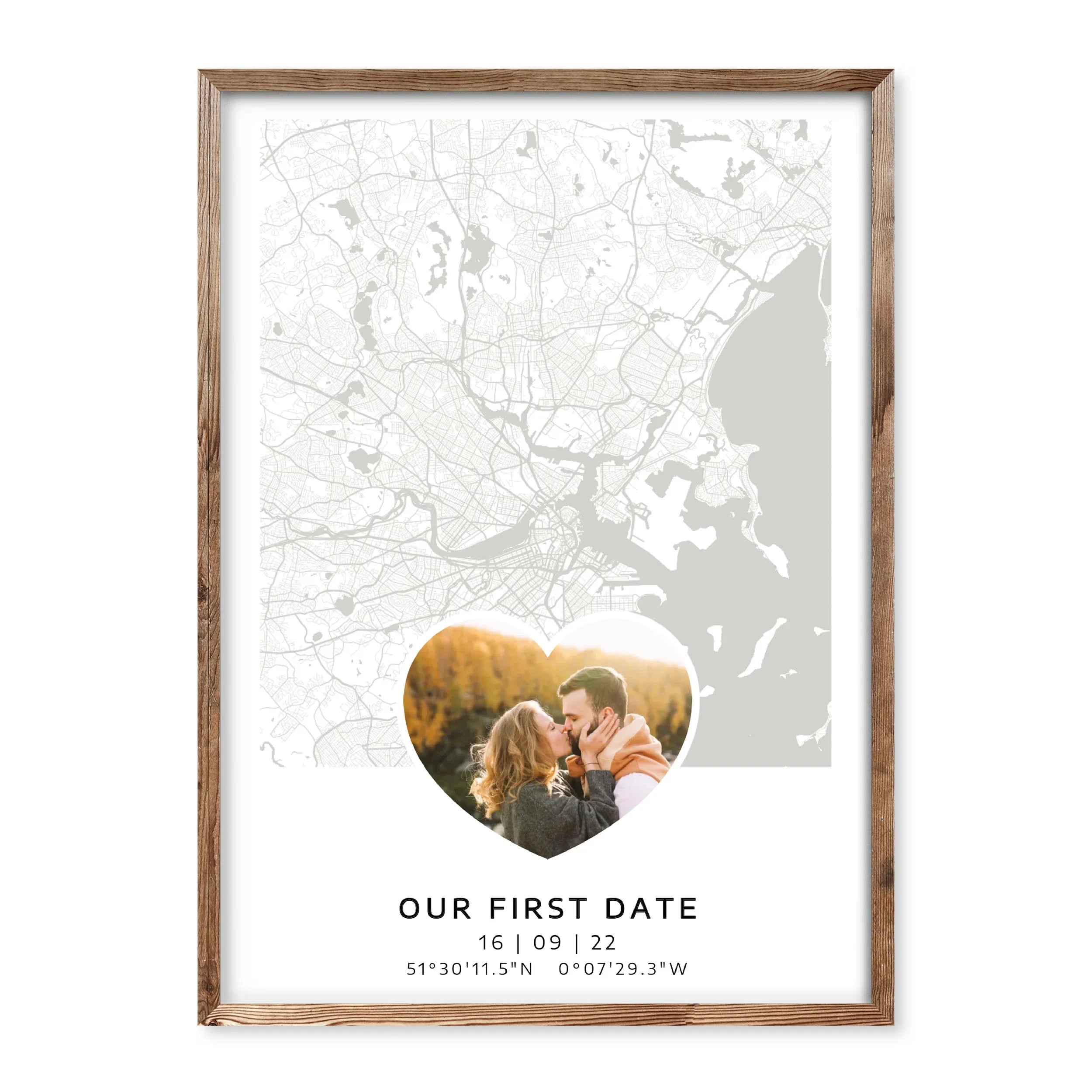 Personalised map poster with heart-shaped photo and coordinates marking the couple's first date, shown with minimalist city map in grey tones.