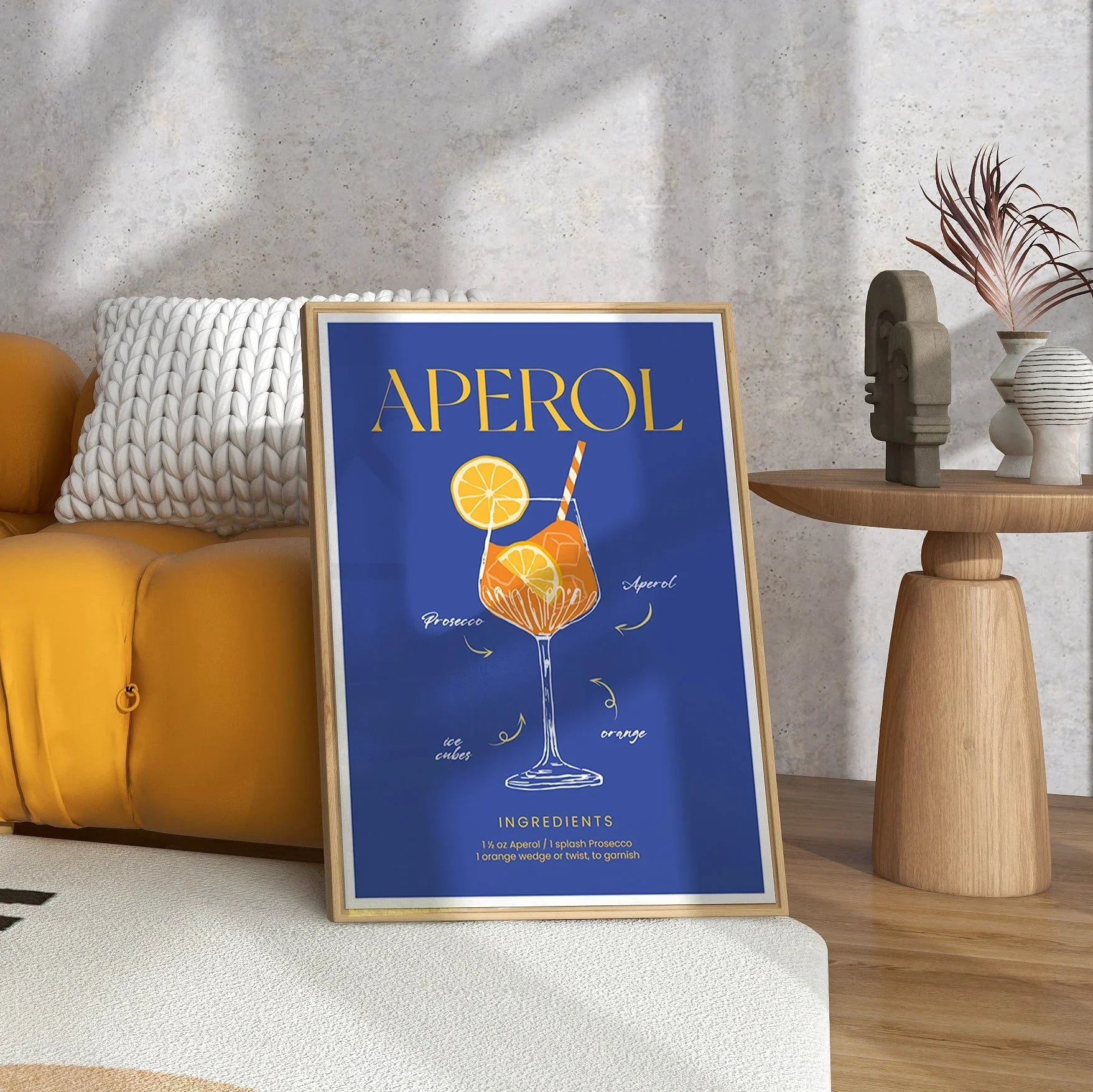 Elegant Aperol Spritz poster featuring a vibrant illustration of a cocktail glass with orange slices, ice cubes, and ingredients labeled, set against a bold blue background.