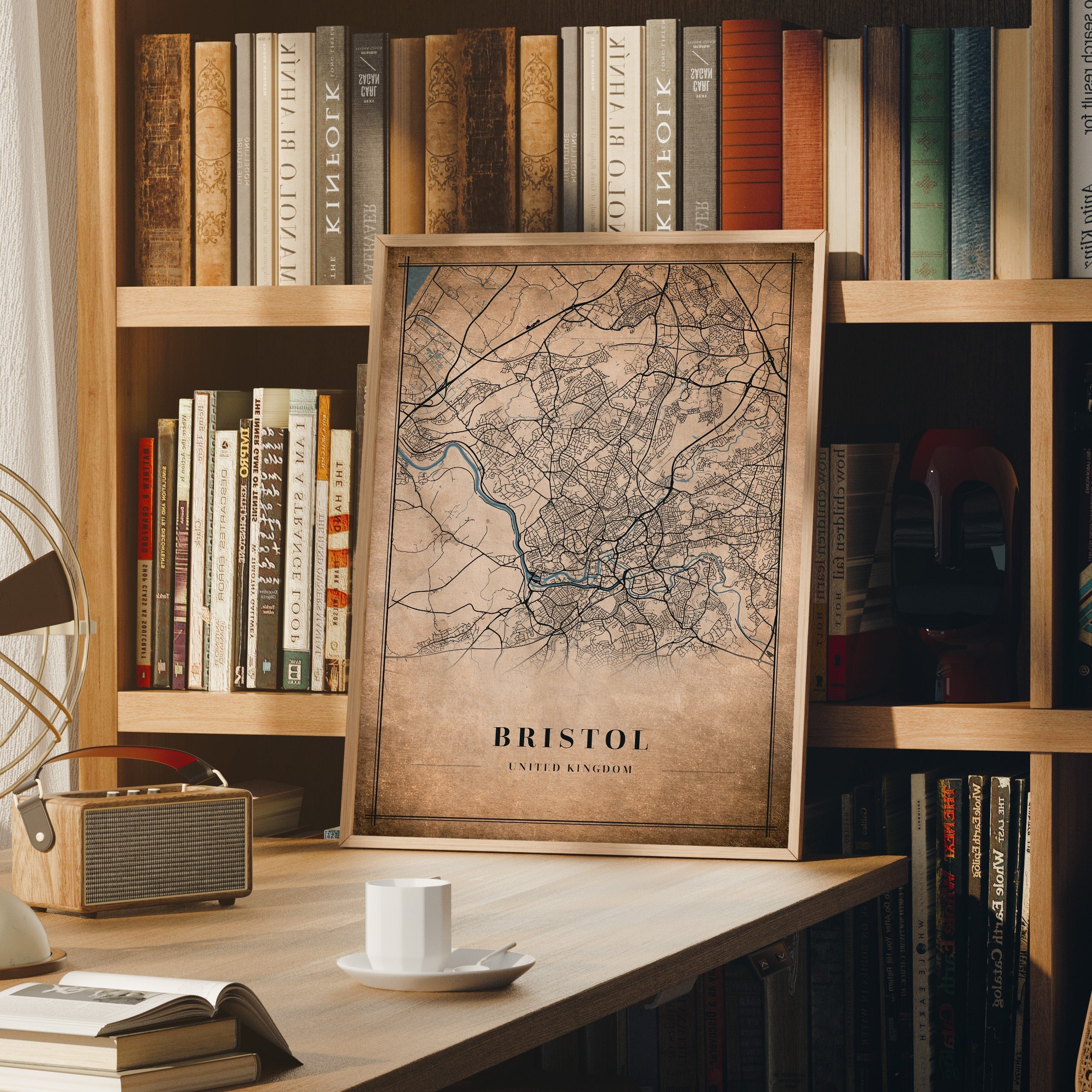 Vintage-style map of Bristol, United Kingdom, in a wooden frame with detailed streets and a sepia-toned background