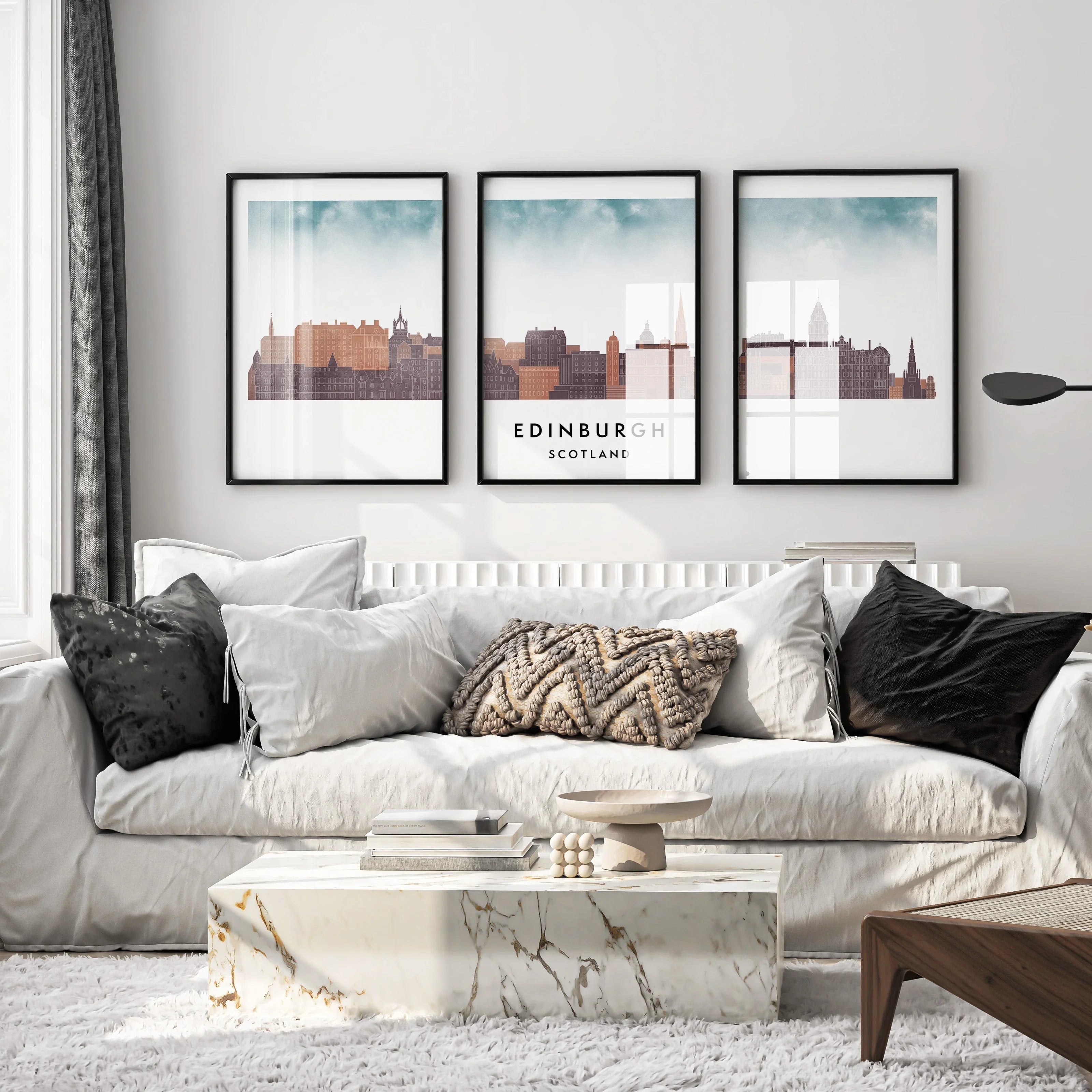 Triptych of Edinburgh skyline posters featuring a watercolor-style design with iconic landmarks and a minimalist aesthetic.