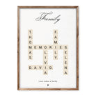 Custom beige Scrabble-style family poster with personalised names, words like “memories” and “love”, and the quote “Love makes a family”.
